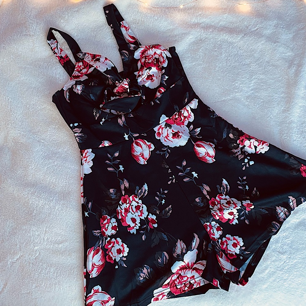 Navy Romper with floral pattern; Tie top
